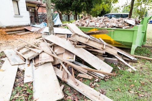 Professional team handling skip collection and disposal in Feltham